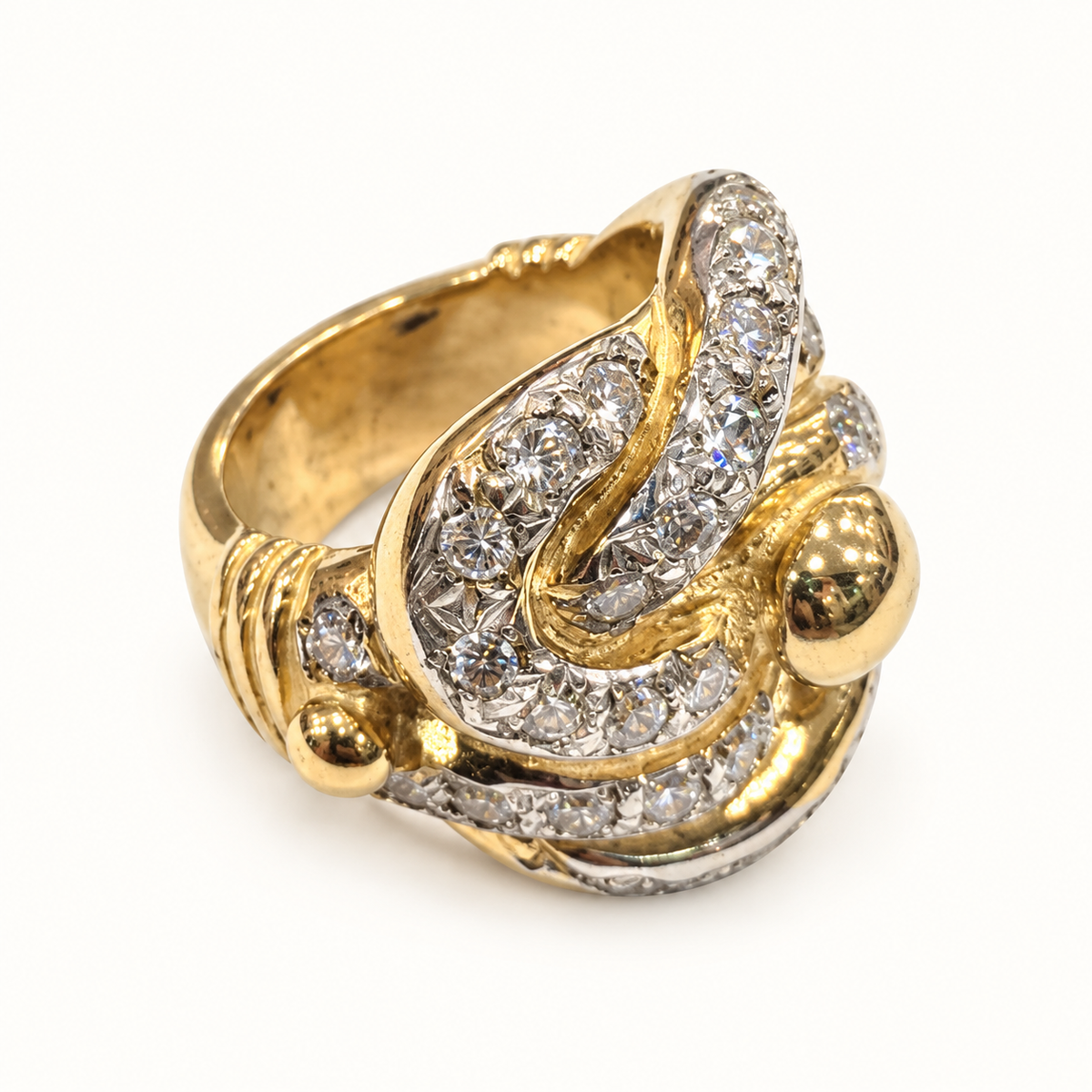 9ct Gold Heavy CZ Knot Ring – 91.5g, side view on ivory
