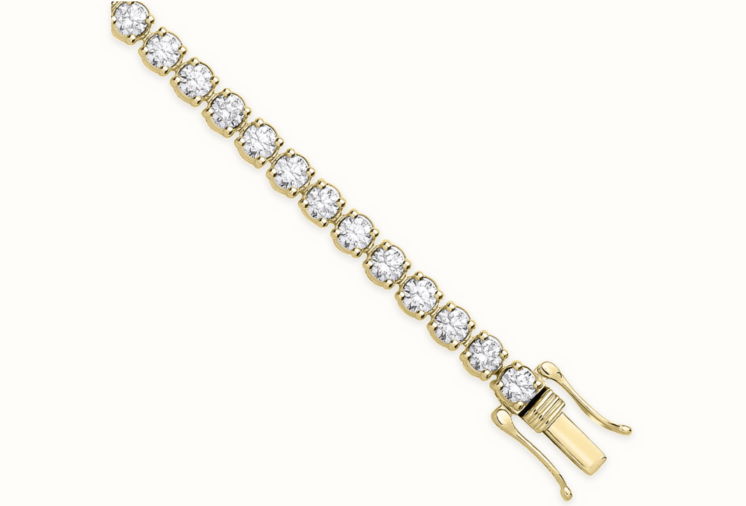LDGBR006 9ct yellow gold lab-grown diamond tennis bracelet, clasp detail, ivory studio background and soft shadow