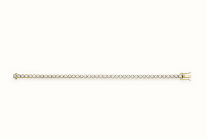 LDGBR006 9ct yellow gold lab-grown diamond tennis bracelet, full view, ivory studio background and soft shadow