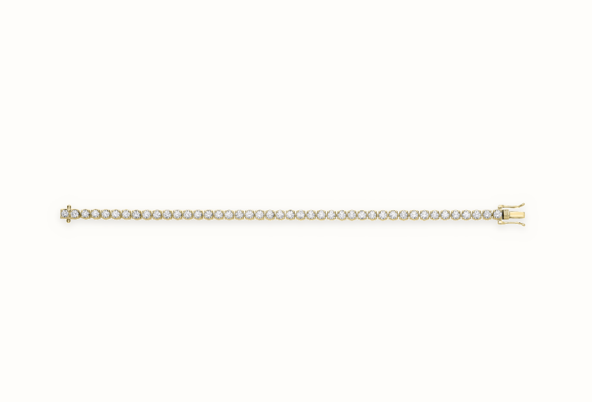 LDGBR008 9ct yellow gold lab-grown diamond tennis bracelet, full view, ivory studio background and soft shadow