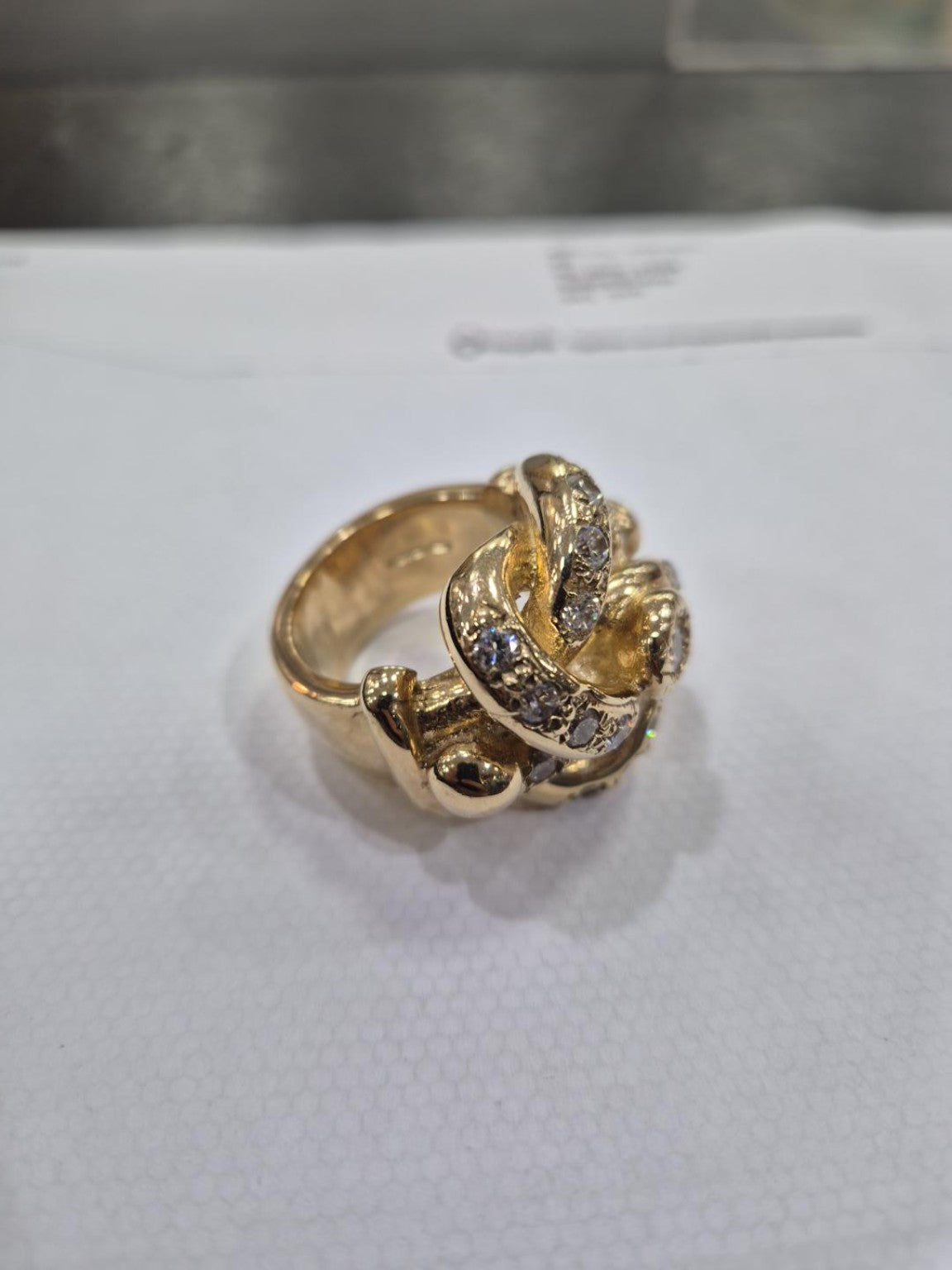 Original side view of 9ct gold lovers knot CZ ring